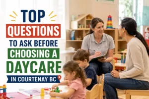 Parent meeting with a childcare educator while children participate in classroom activities, highlighting important factors to consider when choosing a daycare in Courtenay BC for quality early childhood education and care.